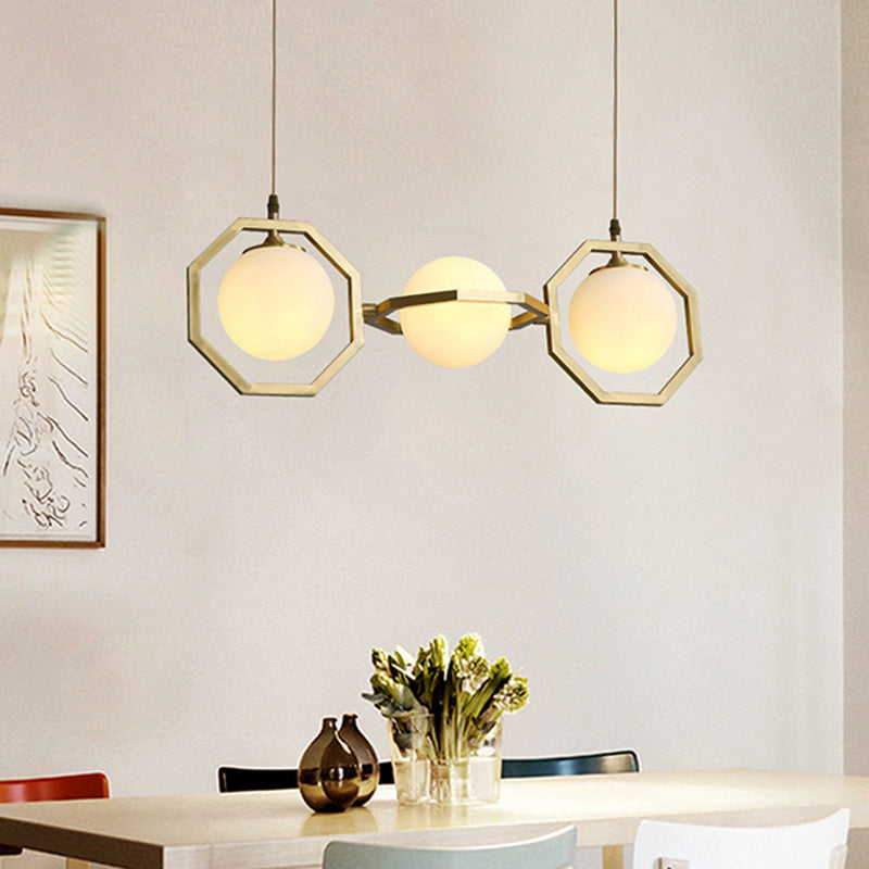 Modern White Frosted Glass Orb Island Light With Gold Octagon Frame - 3-Light Ceiling Pendant Lamp