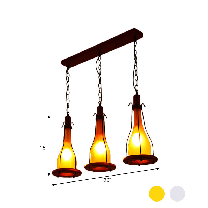 Brown Bottle Pendant Light with Cluster Design - Yellow/White Glass, 3 Heads - for Dining Room Ceiling - Wood Linear Canopy