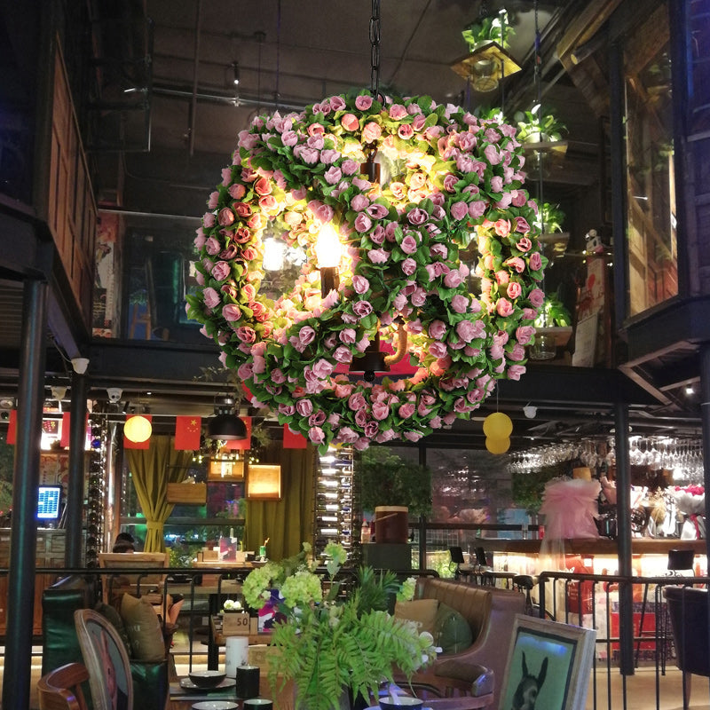 Antique Iron Chandelier With Sphere Design And Three Black Pendant Lights By Candlestick Restaurant