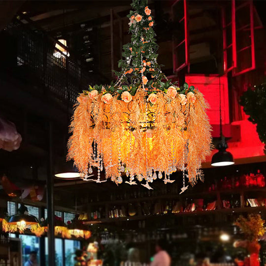 Round Cage Chandelier Light in Orange Metal with Plant Decor - 4-Bulb Pendant Lamp for Warehouse Ceilings