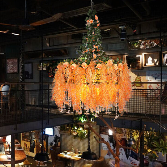 Round Cage Chandelier Light in Orange Metal with Plant Decor - 4-Bulb Pendant Lamp for Warehouse Ceilings