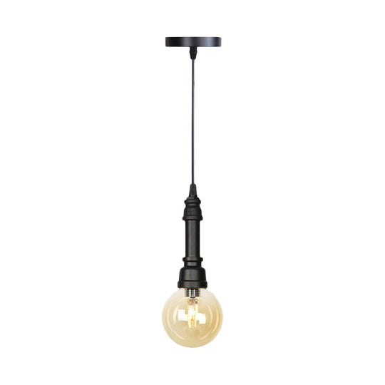 Industrial Black Finish Amber Glass Pendant Lamp with Pipe Suspension - 1-Light Ball/Capsule Ceiling Light