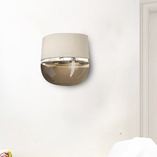 Modern Arched Wall Sconce In White With Grid Pattern Fabric And Tan Glass Bottom