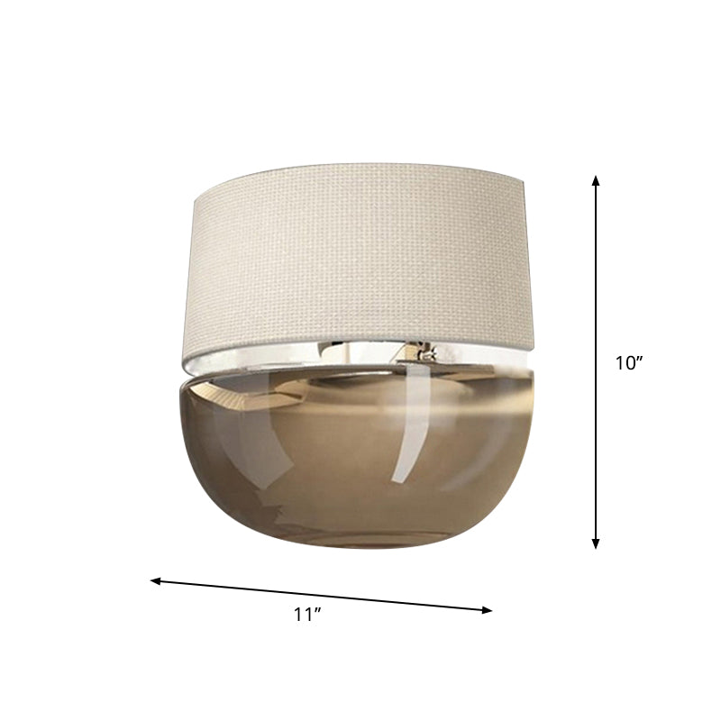 Modern Arched Wall Sconce In White With Grid Pattern Fabric And Tan Glass Bottom