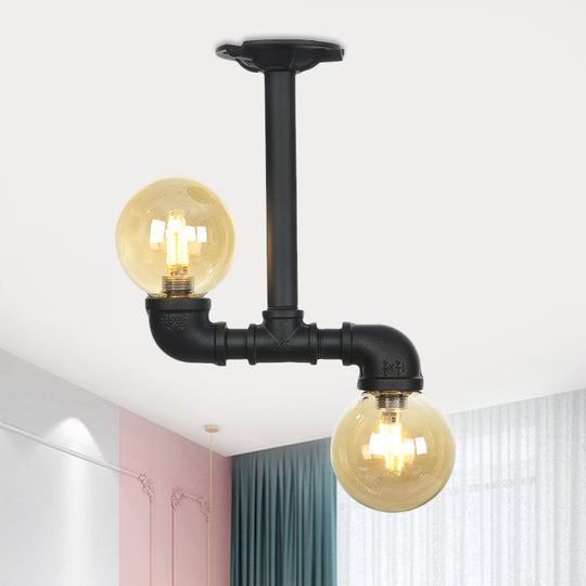 2-Head Semi-Flush Industrial Ball Amber Glass Ceiling Fixture in Black