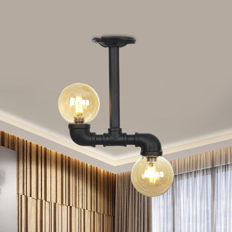 2-Head Semi-Flush Industrial Ball Amber Glass Ceiling Fixture in Black