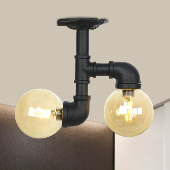 2-Head Semi-Flush Industrial Ball Amber Glass Ceiling Fixture in Black