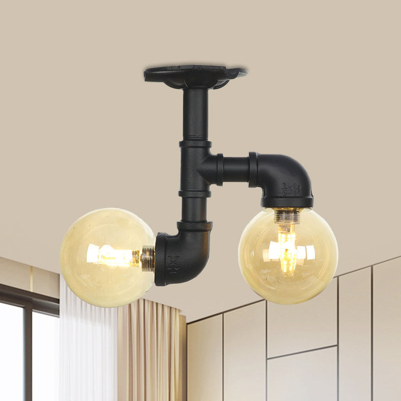 2-Head Semi-Flush Industrial Ball Amber Glass Ceiling Fixture in Black