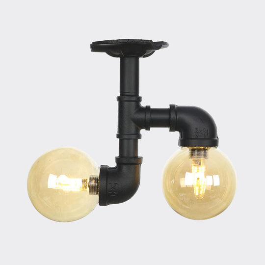 2-Head Semi-Flush Industrial Ball Amber Glass Ceiling Fixture in Black