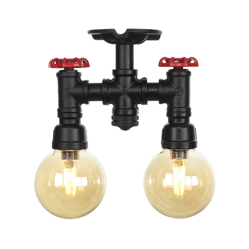 2-Head Semi-Flush Industrial Ball Amber Glass Ceiling Fixture In Black