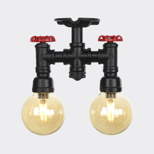 2-Head Semi-Flush Industrial Ball Amber Glass Ceiling Fixture In Black