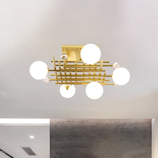 Designer Metallic Flush Mount Ceiling Lamp - Crossing Linear Semi Flush Light with Crystal Ball Deco - 5 Lights Brass