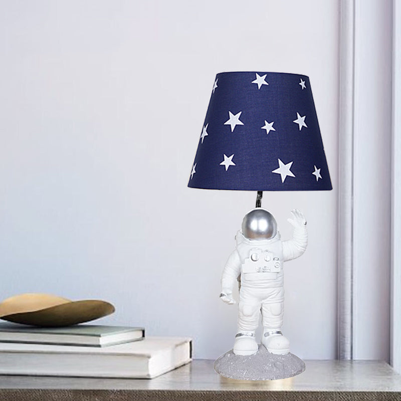 Blue Empire Shade Night Lamp - Kids Star Patterned Fabric Table Lighting With Carved Spaceman Base