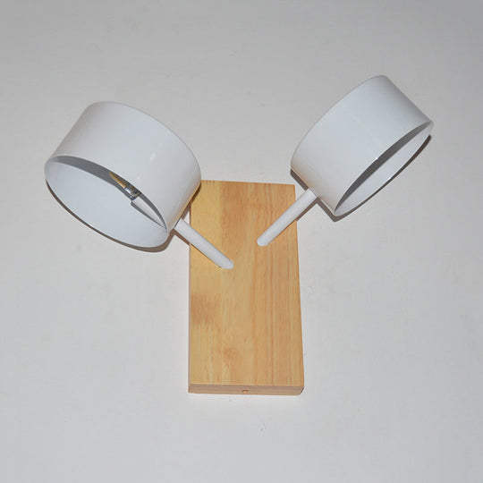 Modernist White Dual Drum Wall Light Fixture With 2 Iron Sconce Heads And Wood Backplate