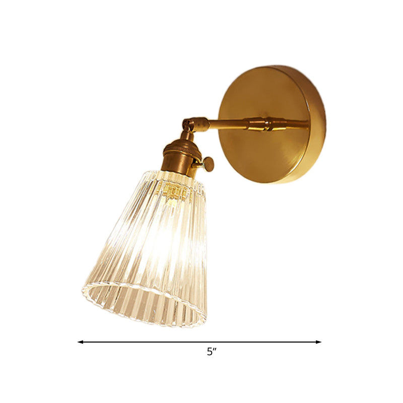 Clear Textured Glass Wall Sconce With Brass Accents For Industrial Dining Room Lighting