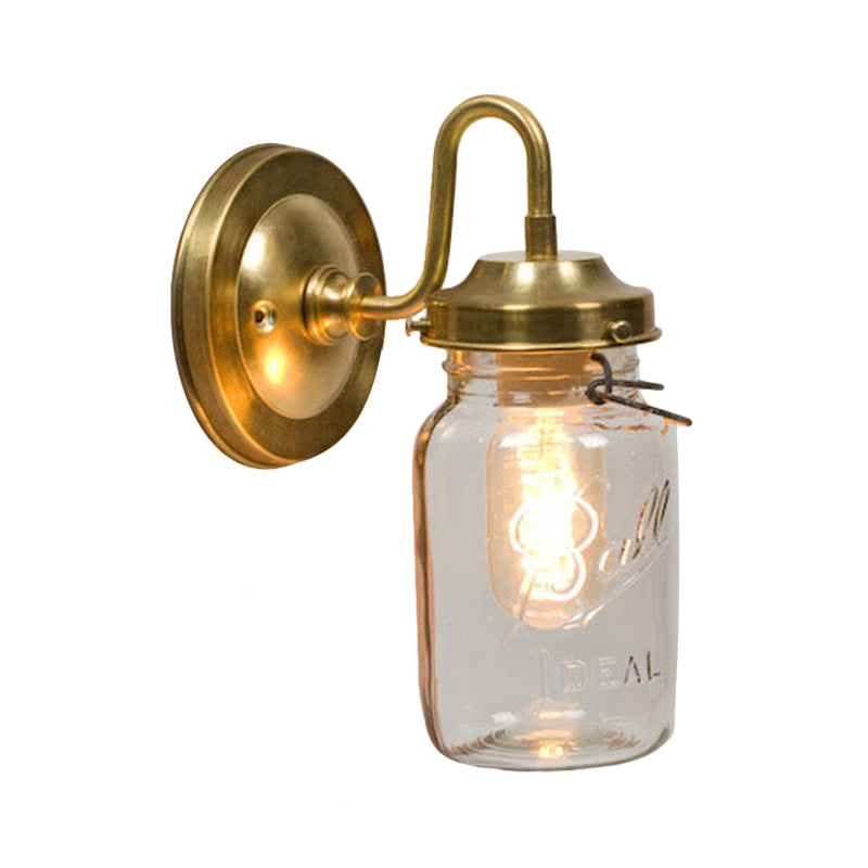 Industrial Clear Glass Wall Sconce With Brass Finish And Letter Detail