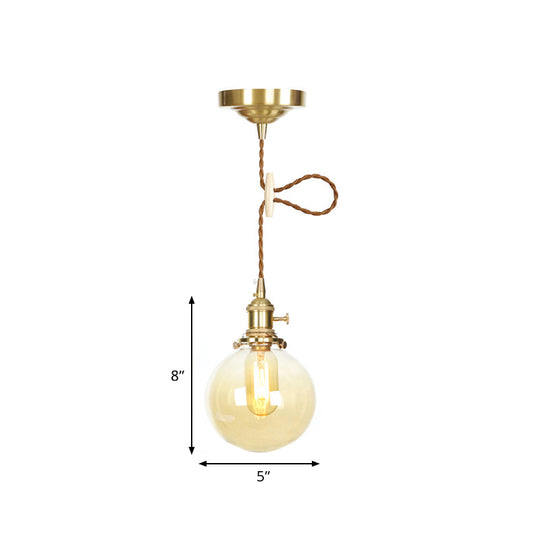 1-Light Amber Pendant Light with Adjustable Cord and Globe Glass Shade - Industrial Indoor Lighting