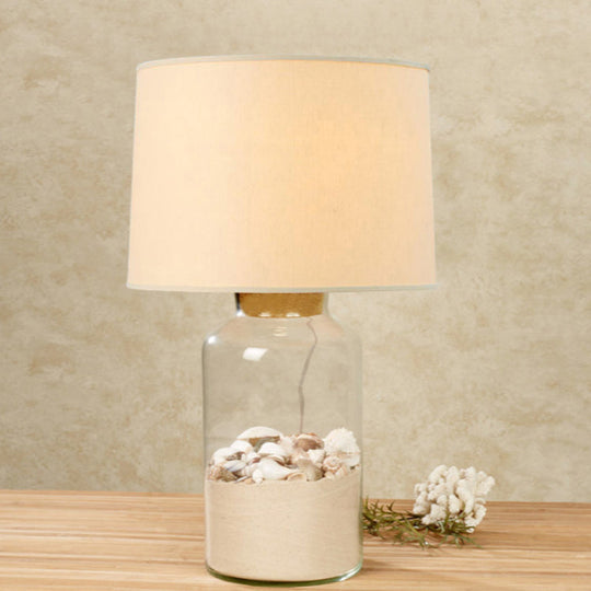 White Traditional Night Table Lamp With Clear Glass Base And Fabric Barrel Shade