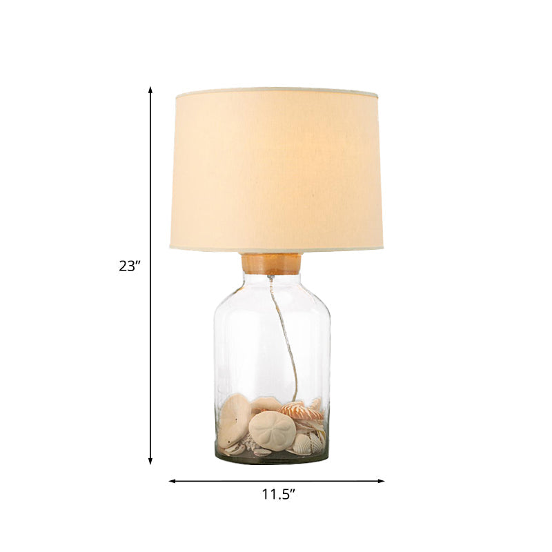 White Traditional Night Table Lamp With Clear Glass Base And Fabric Barrel Shade