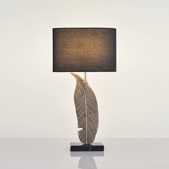 Feather Base Nightstand Lamp In Black With Classic Drum Shade For A Cozy Bedside Ambiance