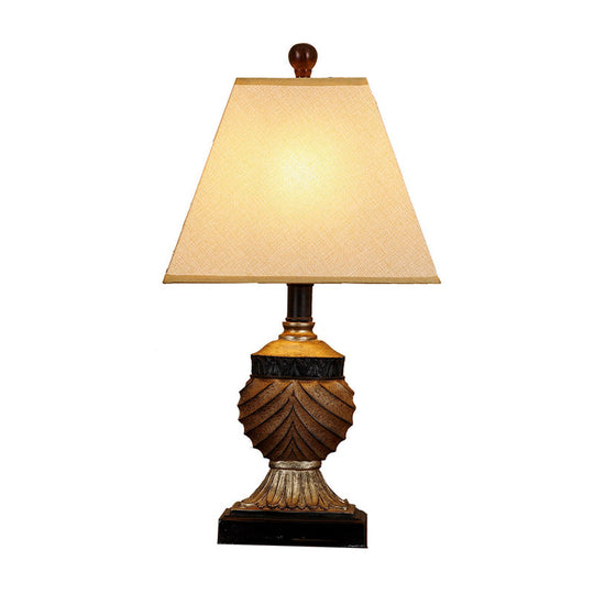 Rustic Pinecone Table Lamp With Resin Base And Trapezoid Fabric Shade