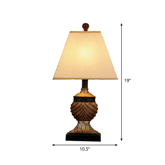 Rustic Pinecone Table Lamp With Resin Base And Trapezoid Fabric Shade