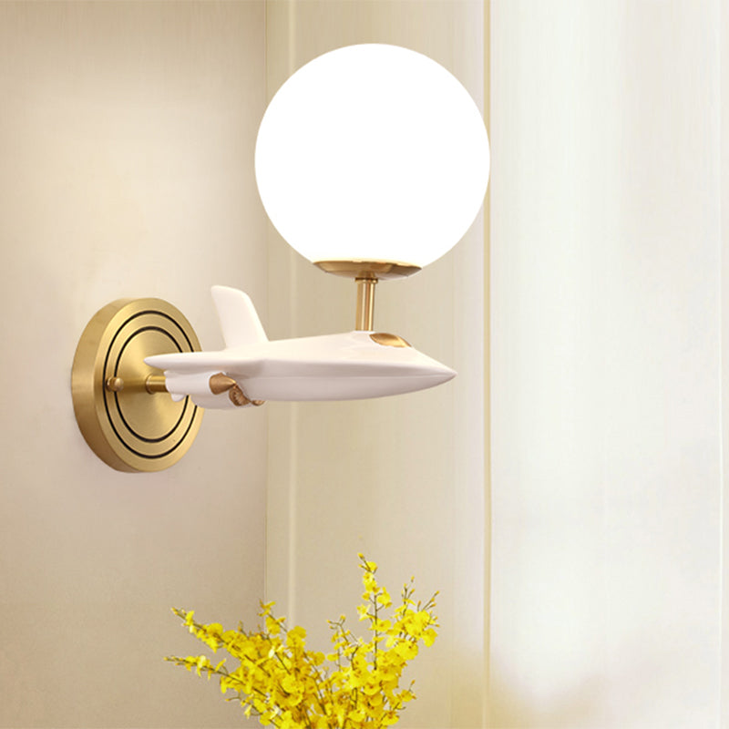 Gold Spaceship Wall Sconce With Cream Glass Globe For Kids Room - 1/2 Bulb Fixture In White &