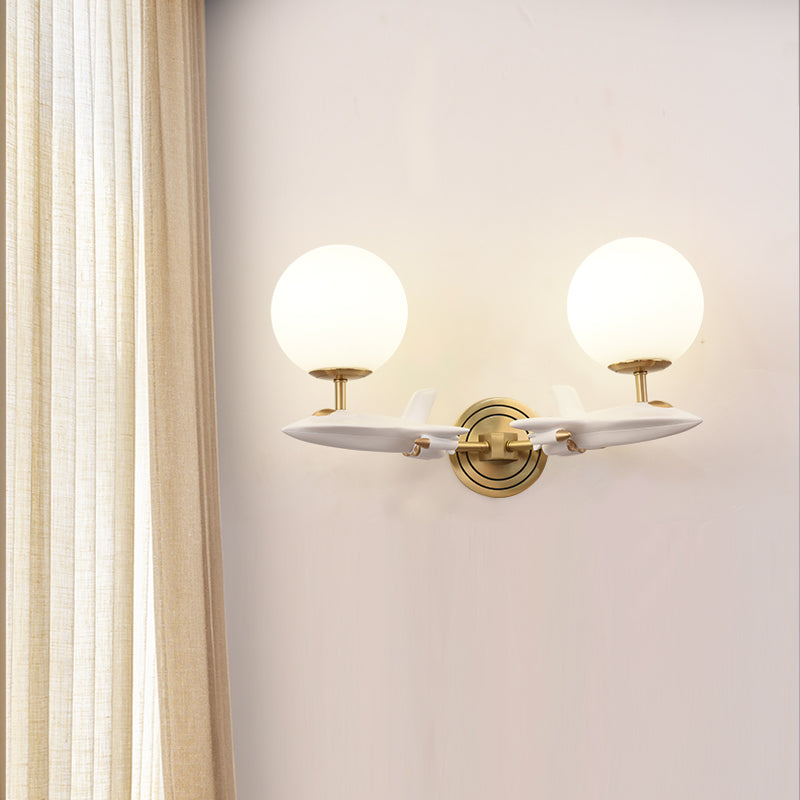 Gold Spaceship Wall Sconce With Cream Glass Globe For Kids Room - 1/2 Bulb Fixture In White &