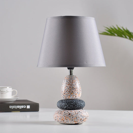 Modernist Led Night Table Lamp In Black/Grey Ceramic Stone Shape With Fabric Shade