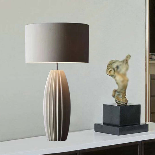 Contemporary 1-Light Ceramic Night Light With Grey Fabric Shade - Modern Drum Nightstand Lamp