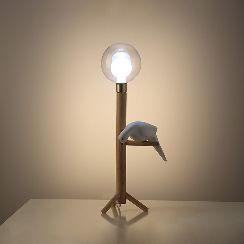 Modernist Wood Table Lamp With Clear Glass Sphere Night Light And Bird Decoled