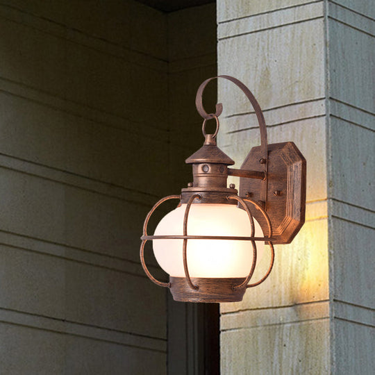 Retro Coffee/Bronze Lantern Wall Light With Wire Cage - Outdoor 1 Head Lighting In White/Clear Glass