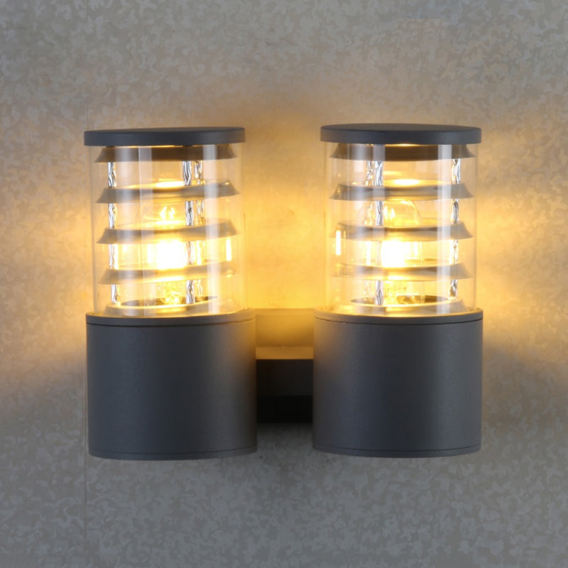 Clear Glass Cylinder Wall Sconce - 2-Light Outdoor Lamp In Grey With Inner Multi Circle Design