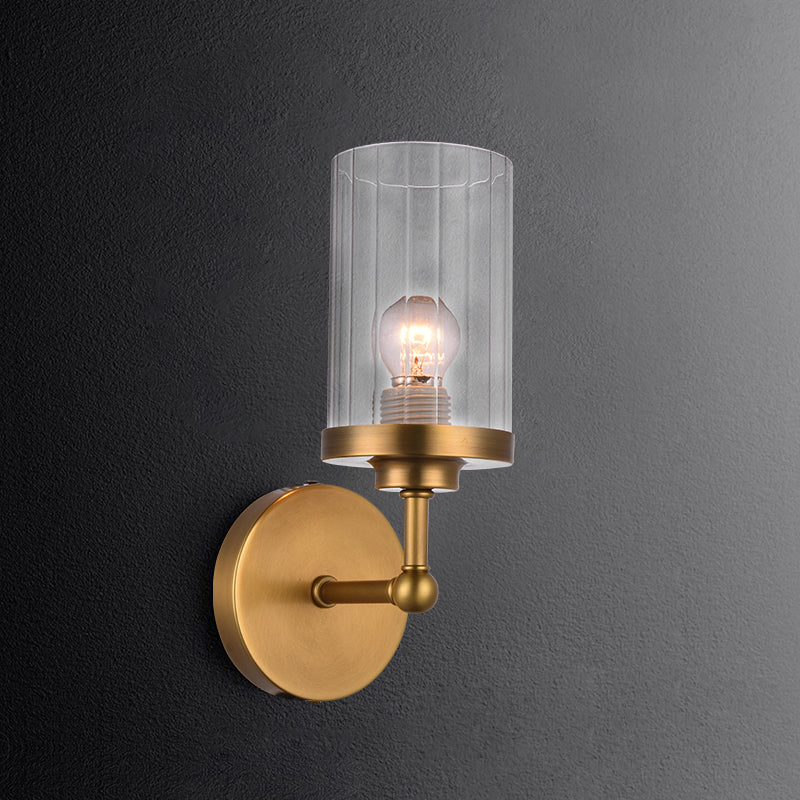 Postmodern 1-Head Brass Cylinder Wall Lighting With Clear Ribbed Glass Mount