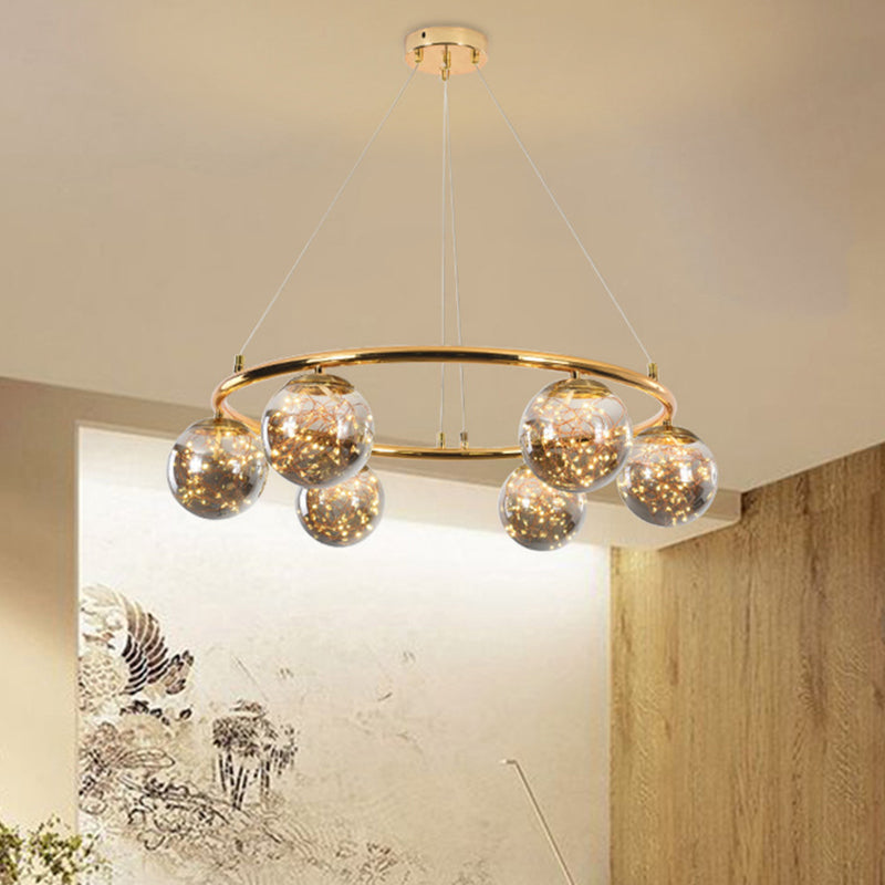 Modernist Smoke Gray Glass Ball Chandelier - 6 Head Brass Ring Pendant Light with Unique Glowworm Design