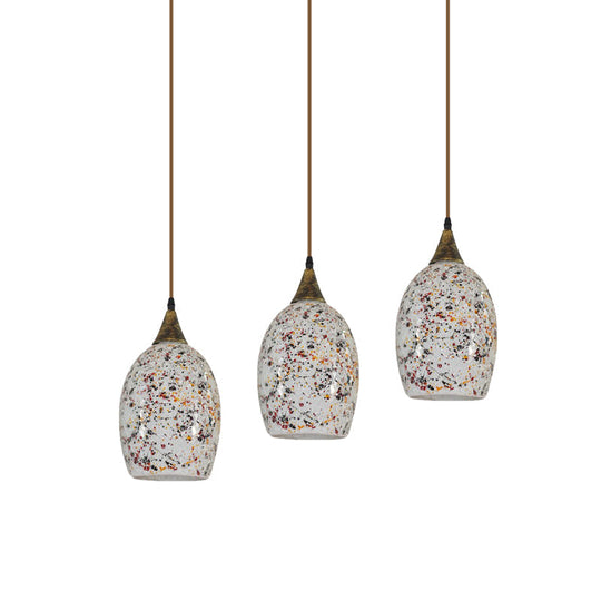 Spotted Glass Ellipse Multi-Pendant Light with Baroque Cut Brass and 3 Down Lights