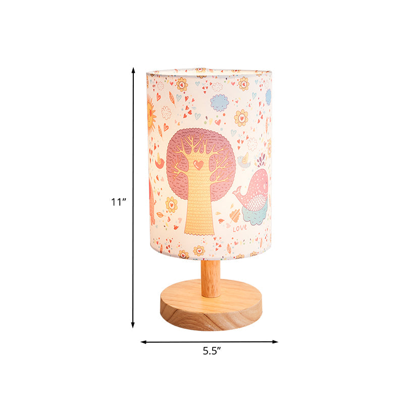 Kids Wood Cylinder Nightstand Lamp With Tree And Flower Pattern - Fabric Shade