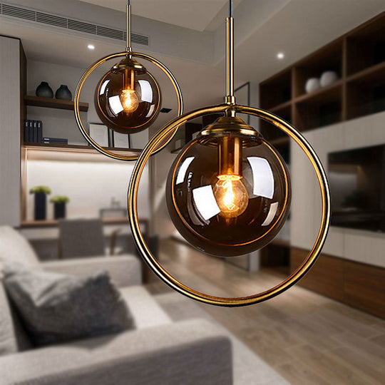 Post-Modernist Glass Ball Pendant Light With Ring Frame - Amber/Smoke/Clear Amber