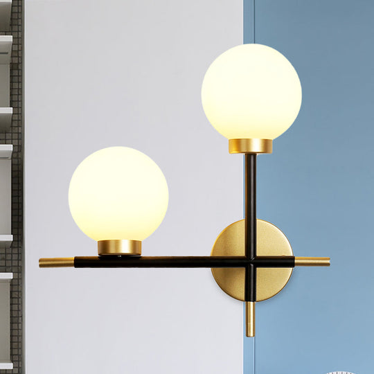 Modern Black Double Globe Wall Lamp With Cross Design - 2-Bulb Milky Glass Sconce Light Fixture For