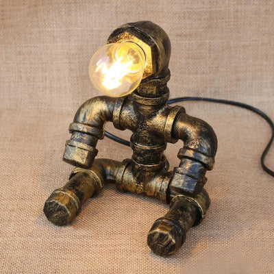 Vintage Stylish Sitting Robot Wrought Iron Table Lamp With Antique Brass Plumbing Pipe / A