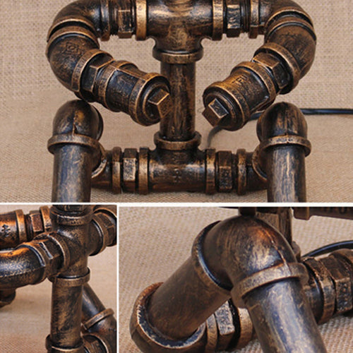 Vintage Stylish Sitting Robot Wrought Iron Table Lamp With Antique Brass Plumbing Pipe