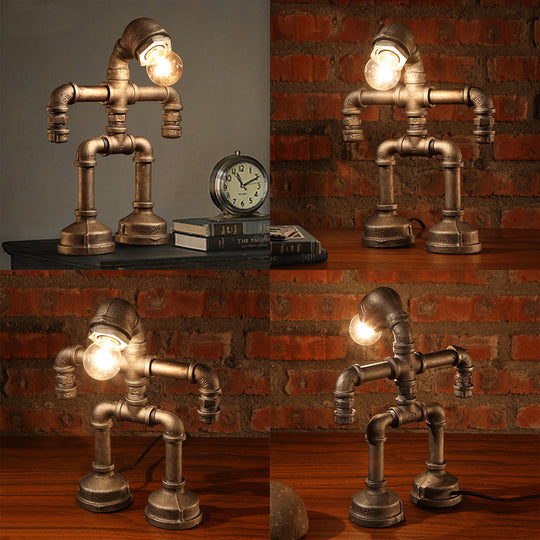 Vintage Stylish Sitting Robot Wrought Iron Table Lamp With Antique Brass Plumbing Pipe